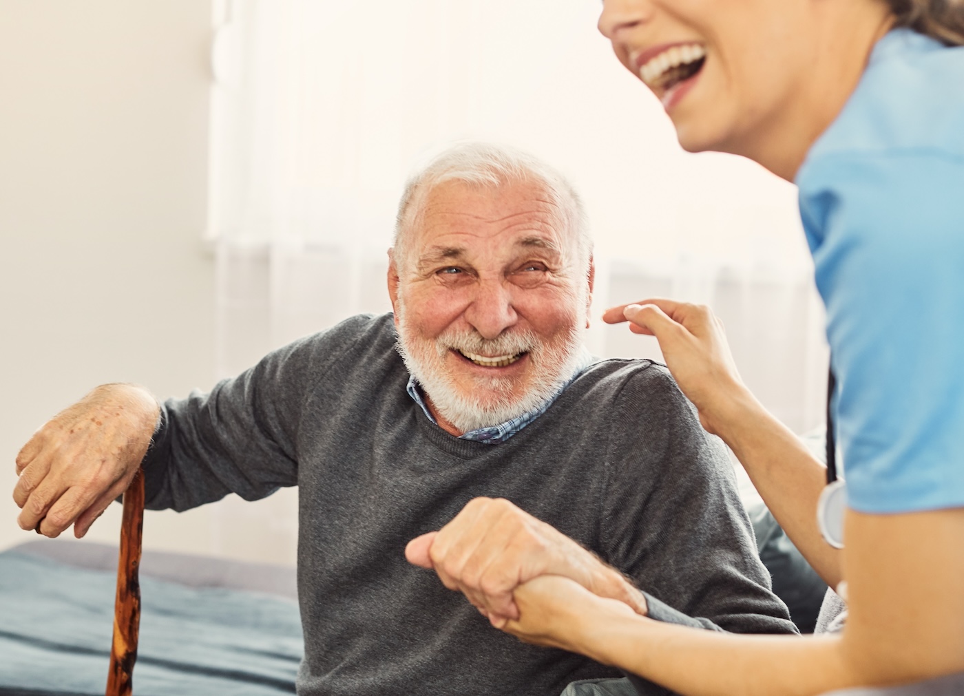 Caregiver helping senior patient