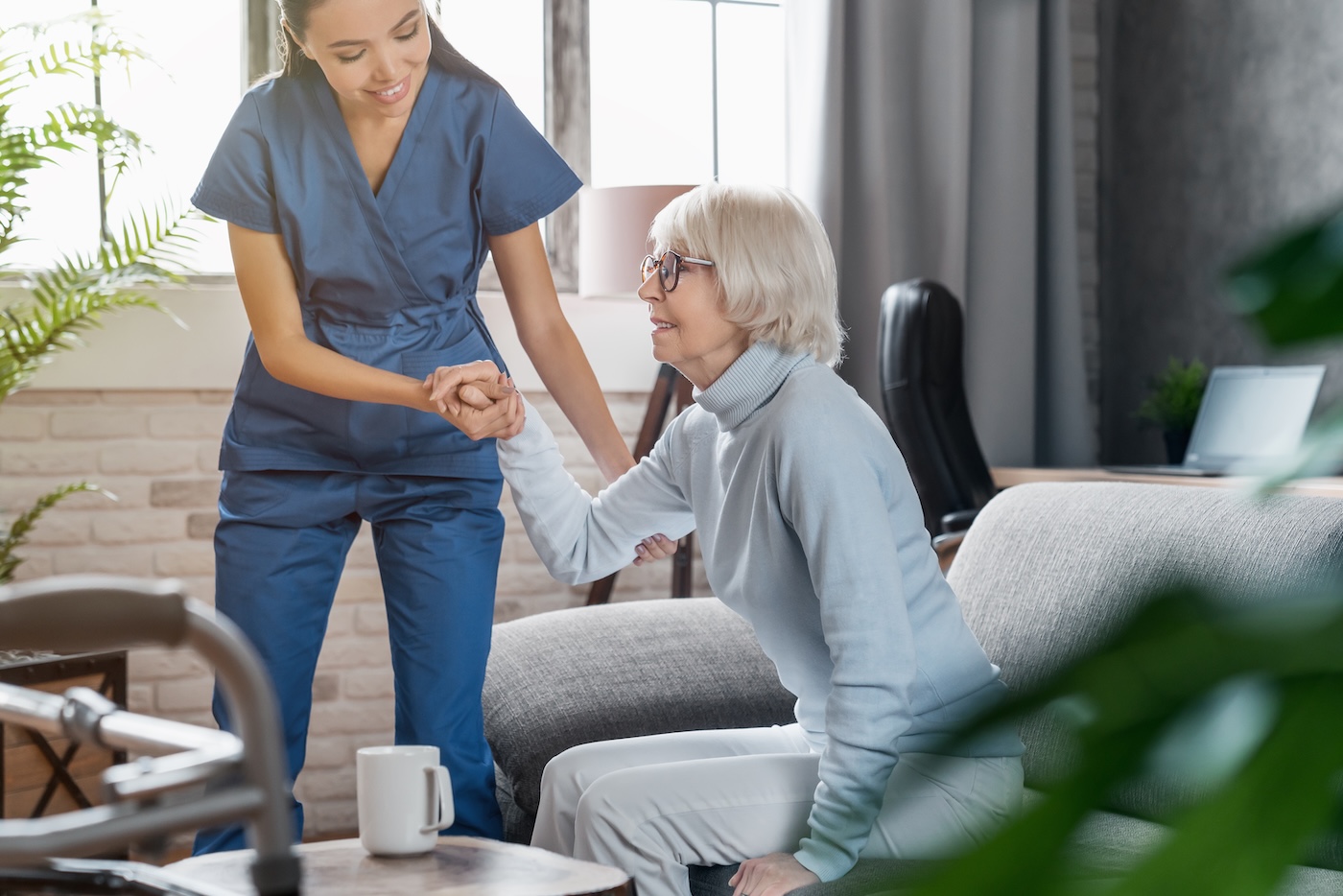 Professional caregiver with elderly woman